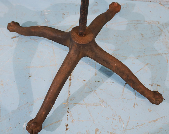 410c - Old store dress maker with cast iron base