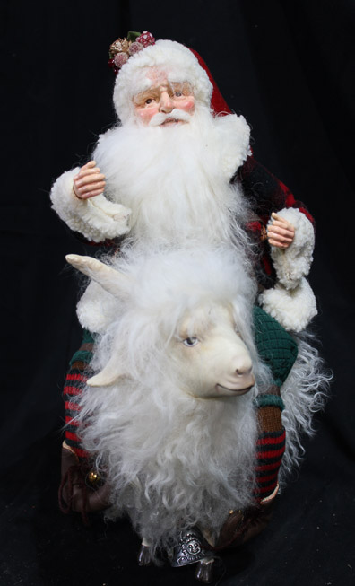 452a - Santa riding a white goat