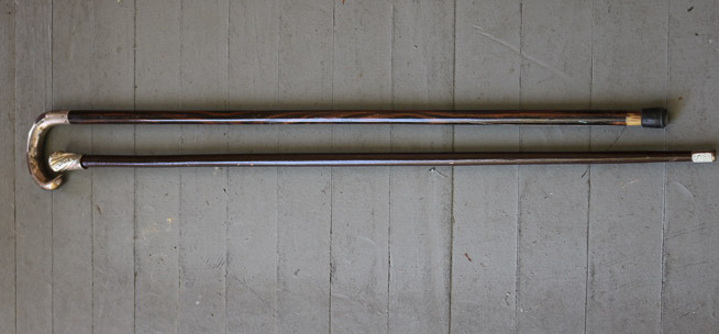 240a - 2 black wood walking canes with silver handles