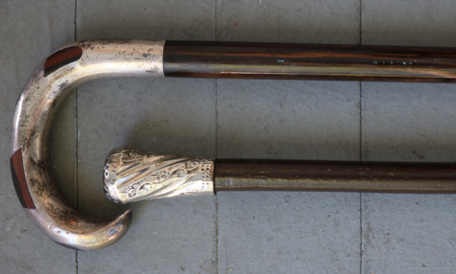 240b - 2 black wood walking canes with silver handles