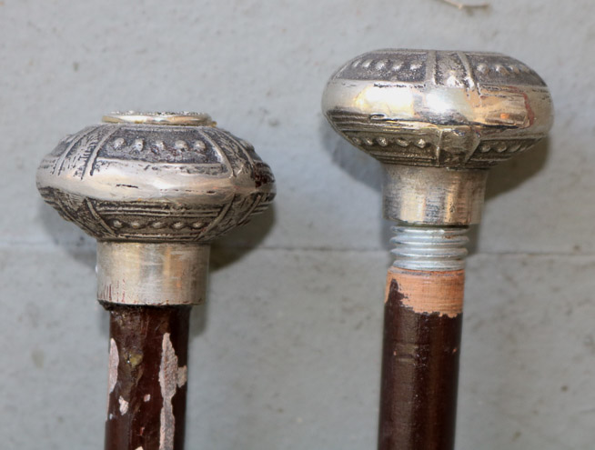 292b - Pair of wooden walking sticks with silver handles