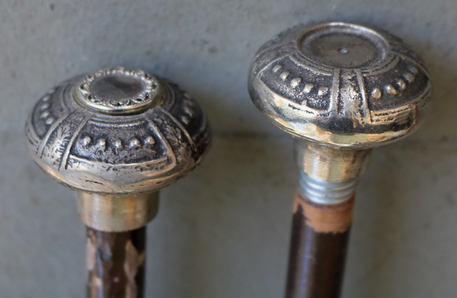 292c - Pair of wooden walking sticks with silver handles